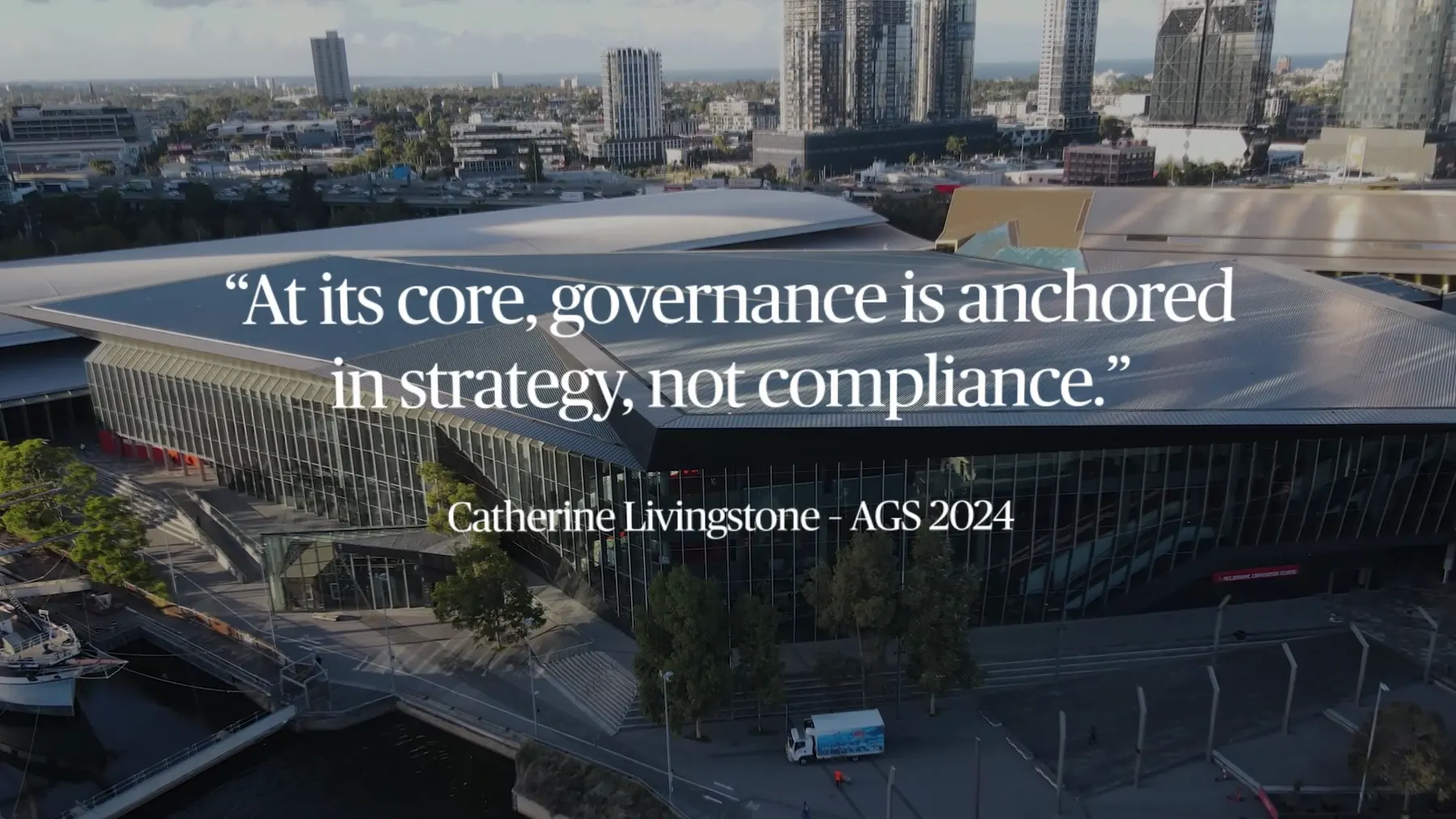 A pull quote set over an aerial of the venue